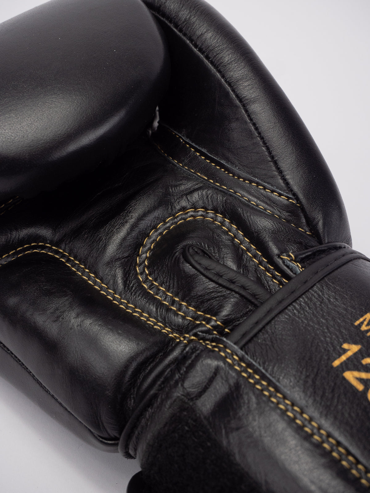 THAI SERIES BLACK GOLD LEATHER BOXING GLOVES