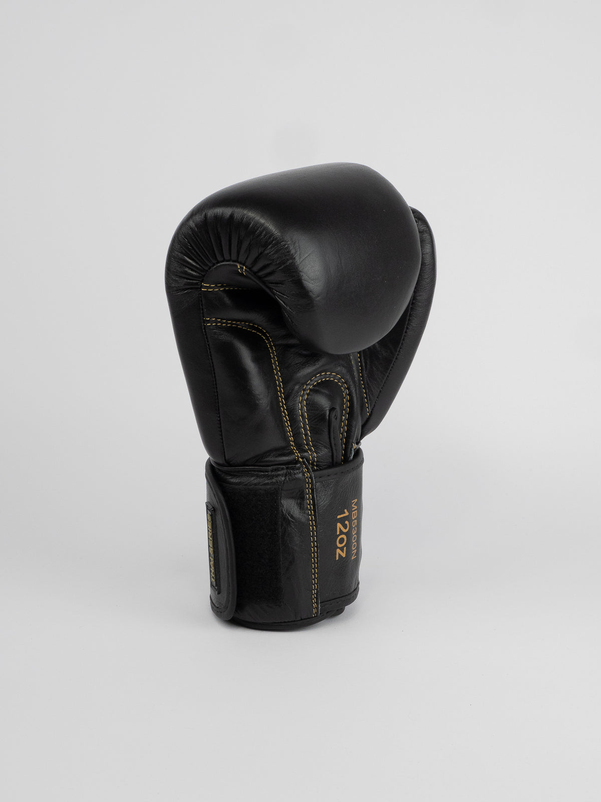 THAI SERIES BLACK GOLD LEATHER BOXING GLOVES