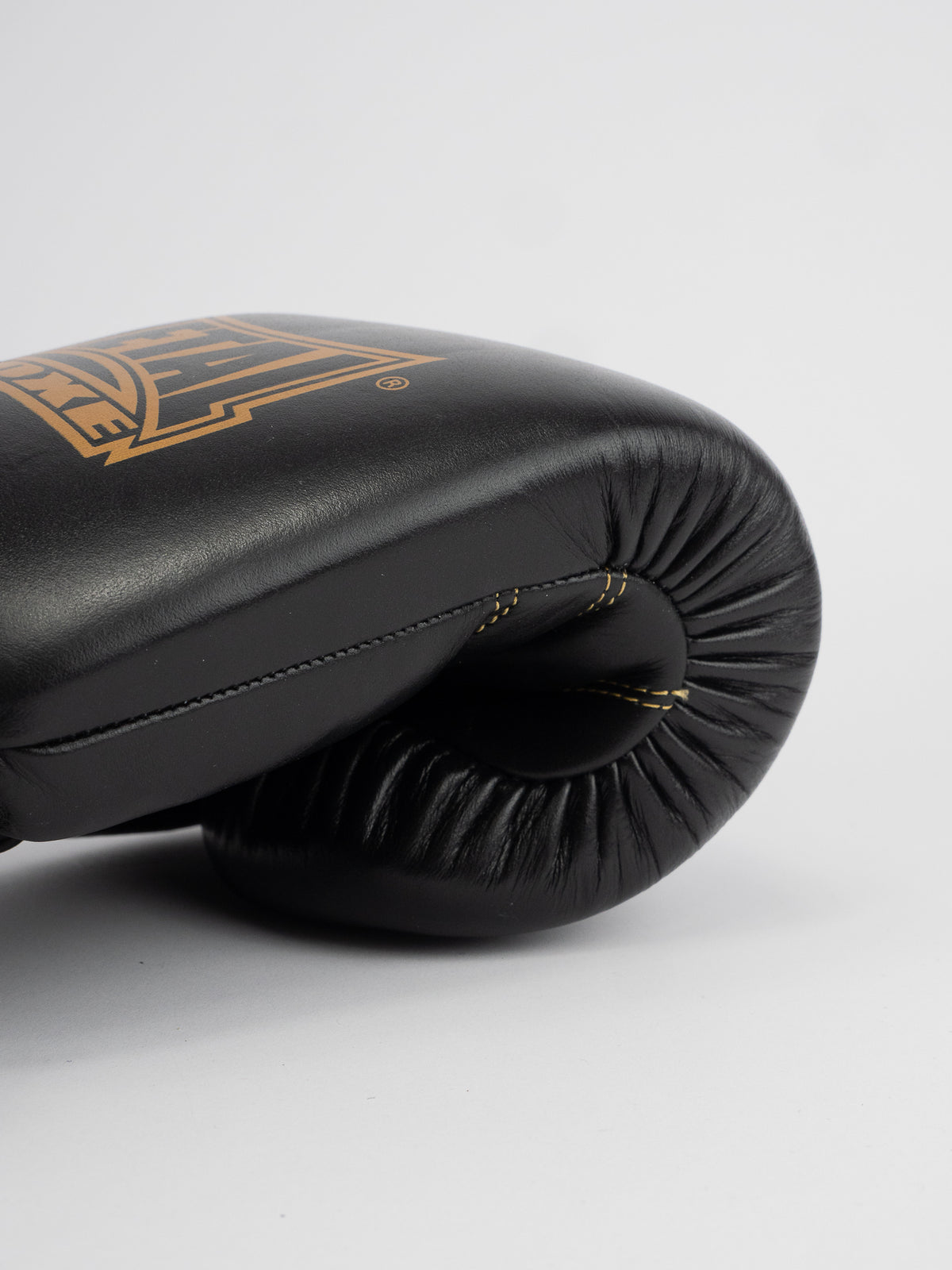 THAI SERIES BLACK GOLD LEATHER BOXING GLOVES