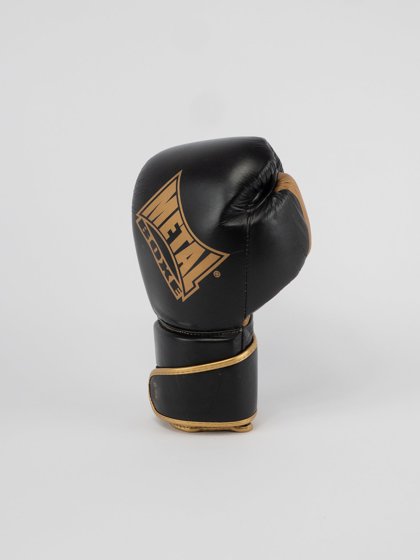 TITAN BLACK GOLD BOXING GLOVES