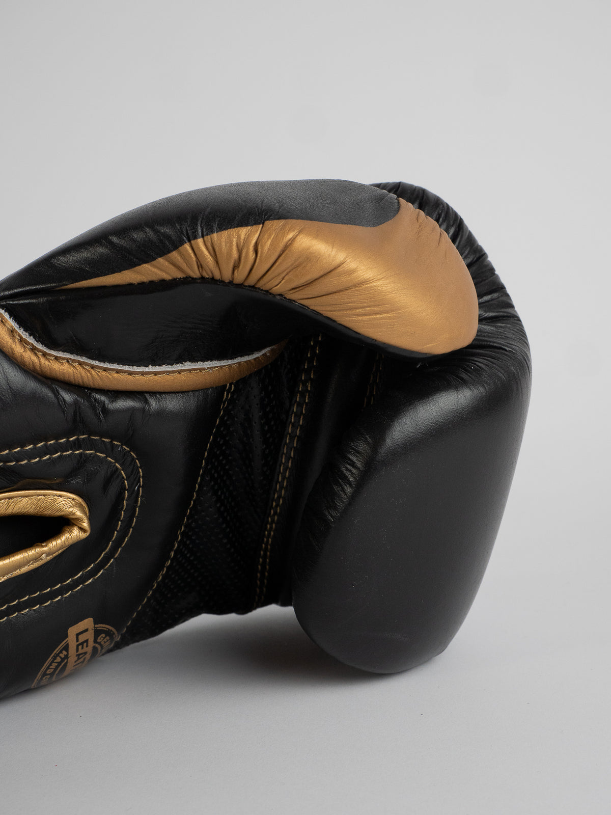 TITAN BLACK GOLD BOXING GLOVES