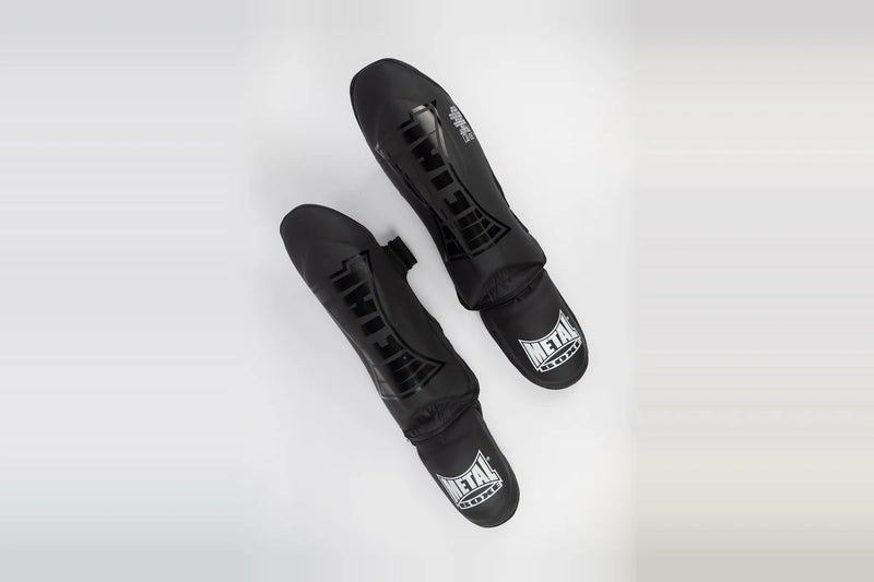 Protège-tibia de boxe thaï et compétition